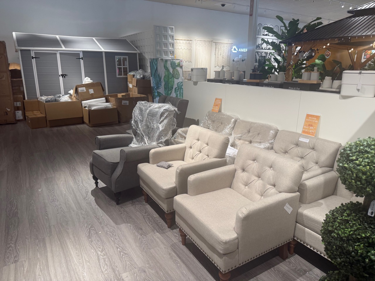 Rows of upholstered chairs prepared for retail display